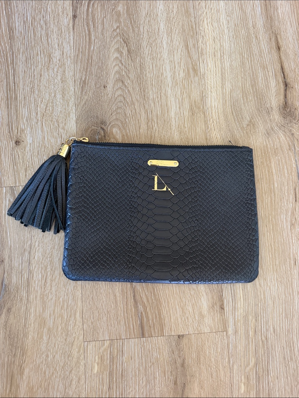 GiGi New York Black Embossed Tassel Zip Wristlet